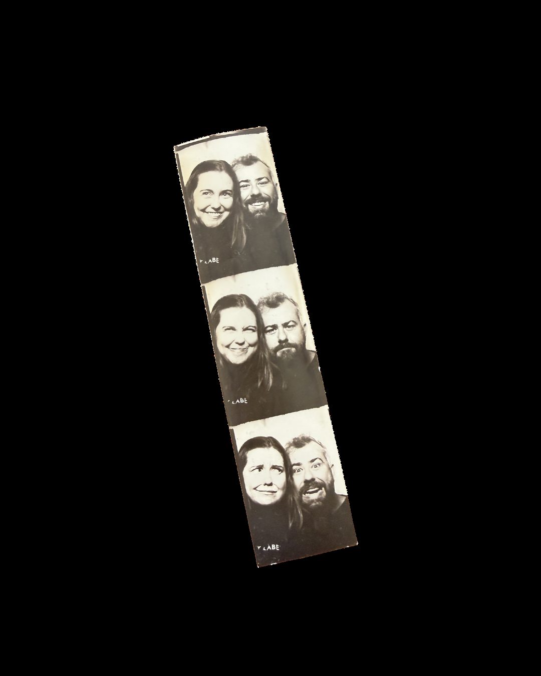 A real photo-booth strip of a couple pulling faces together across three frames